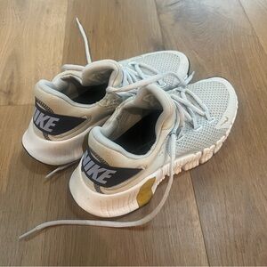 Nike Women’s Blue and Gold Sneakers